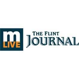 Logo of MLive's The Flint Journal with "m live" in a square next to the text "The Flint Journal.